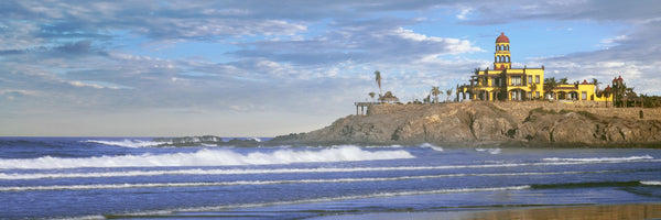 Waves on beach with Hacienda Cerritos hotel in the background, Cerritos Beach, Baja California Sur, Mexico