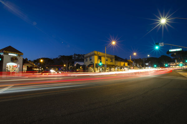Light streaks on street at night, Laguna Beach, California, USA