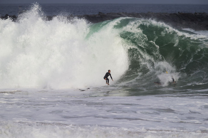 Man surfing in the Pacific Ocean, Newport Beach, California, USA