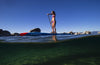 Woman paddleboarding in the lake, Lake Tahoe, Nevada, USA