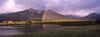 Double rainbow over mountain range, Alberta, Canada
