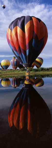 Reflection of hot air balloons in a lake, Hot Air Balloon Rodeo, Steamboat Springs, Routt County, Colorado, USA
