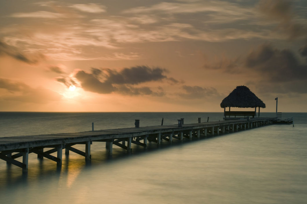 Pier with palapa at sunrise, Ambergris Caye, Belize