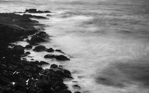 Long exposure shot of waves and rocks on the coast, California, USA