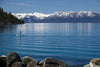 Man paddle boarding in a lake, Lake Tahoe, California, USA