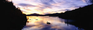 Sunset over a lake, Saranac Lake, Adirondack Mountains, New York State, USA