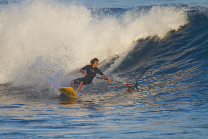 Kai Lenny a famous surfer surfing in the ocean, Ho'Okipa, Maui, Hawaii, USA