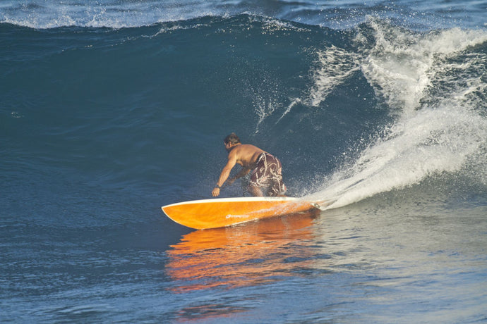 Dave Kalama a famous surfer surfing in the ocean, Maui, Hawaii, USA