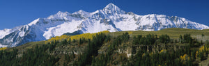 Low angle view of snowcapped mountains, Rocky Mountains, Telluride, Colorado, USA