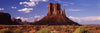 Rock formations on a landscape, The Mittens, Monument Valley Tribal Park, Monument Valley, Utah, USA