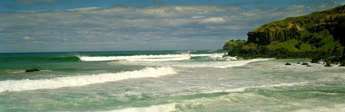 Waves breaking on the shore, backside of Lennox Head, New South Wales, Australia