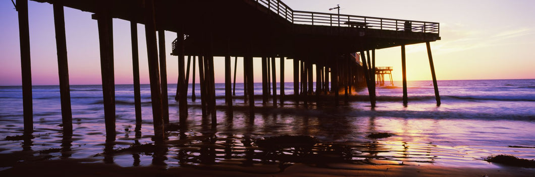 Silhouette of a pier at dusk, Pismo Pier, Pismo Beach, San Luis Obispo County, California, USA