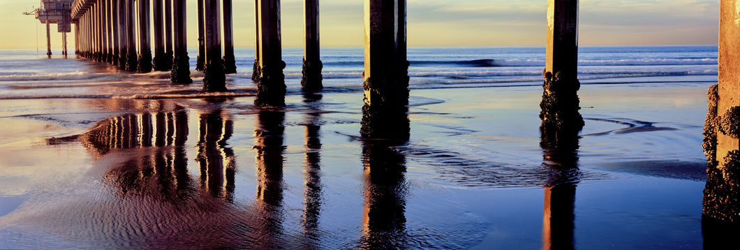 Pier on beach at sunset, La Jolla, San Diego, California, USA