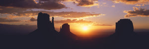 Silhouette of buttes at sunset, The Mittens, Monument Valley Tribal Park, Monument Valley, Utah, USA