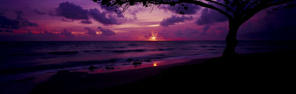 Sunrise over the sea, Pounders Beach, Oahu, Hawaii, USA
