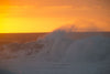 Waves splashing on beach at sunset, Hawaii, USA