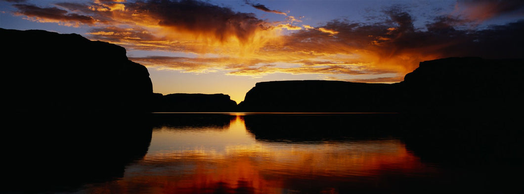 Silhouette of rocks at dusk, Lake Powell, Utah, USA
