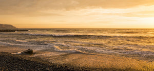 Surf on beach at dusk, Playa Waikiki, Miraflores District, Lima, Peru